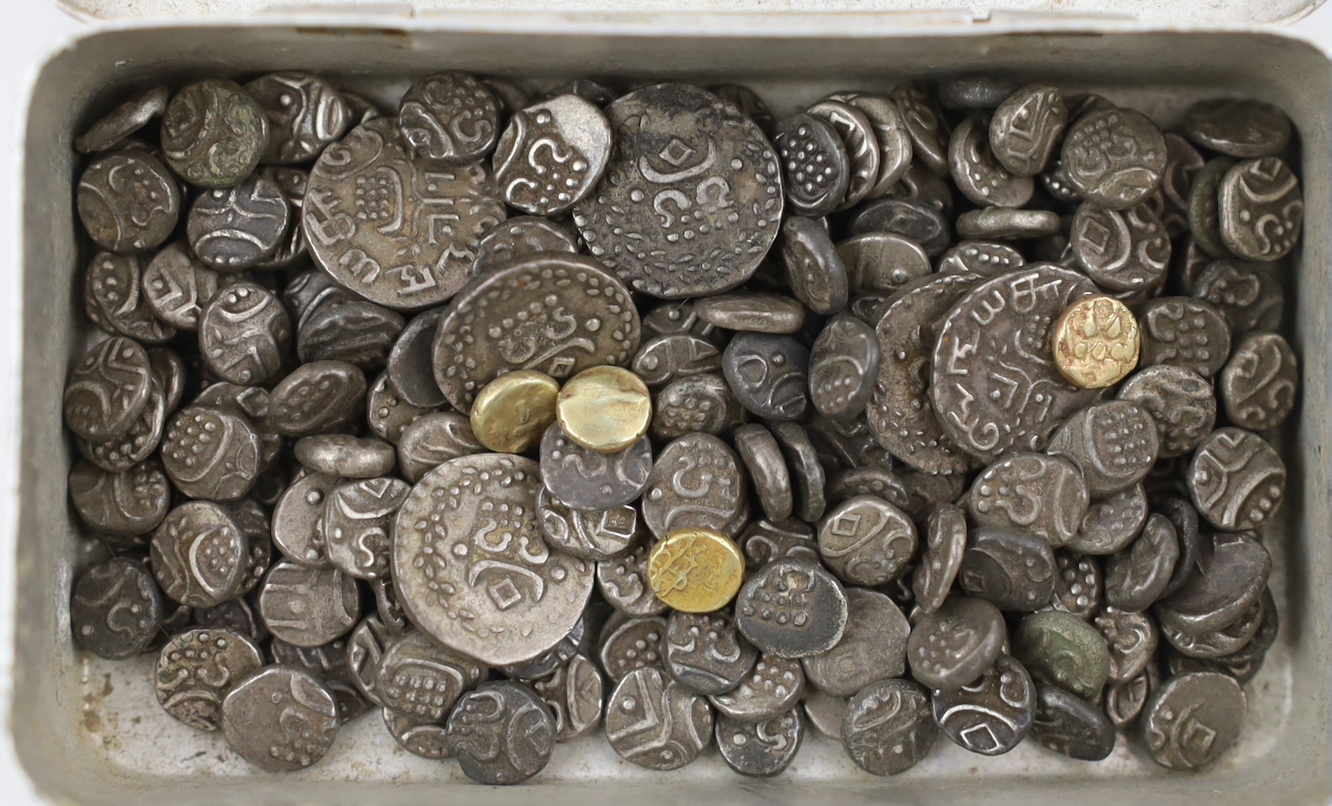 Indian Princely States, dump silver and gold coins, 19th century, including Travancore velli fanam (KM #22), four gold fanam, approx. 0.38g each